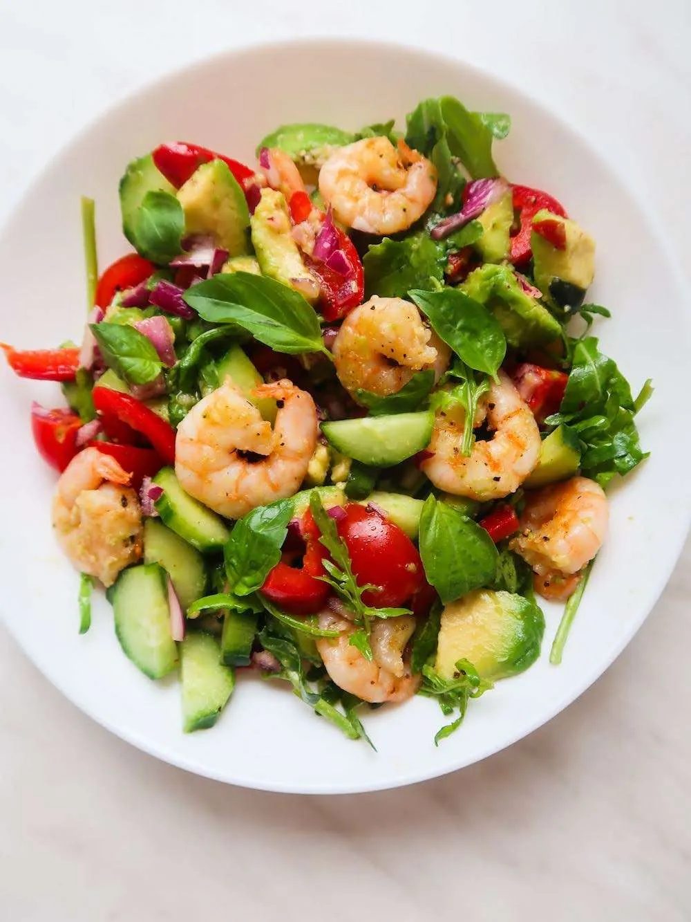 Fresh arugula avocado shrimp salad for weight loss