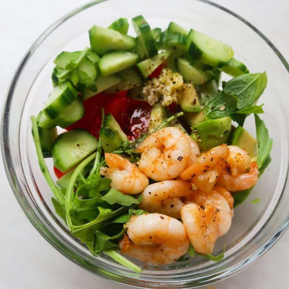Fresh arugula avocado shrimp salad for weight loss