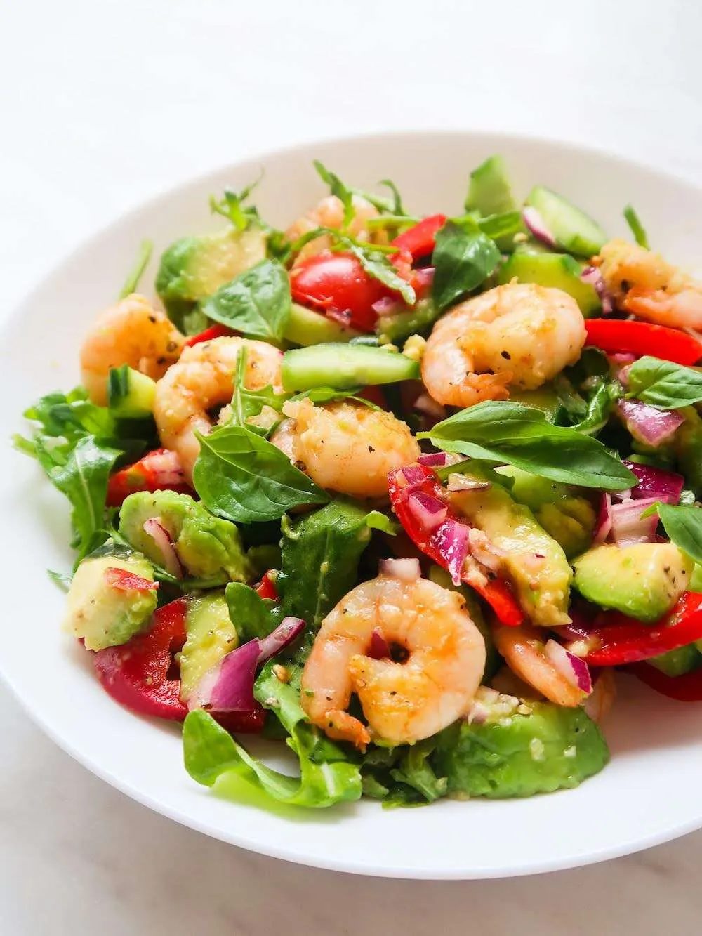 Fresh arugula avocado shrimp salad for weight loss