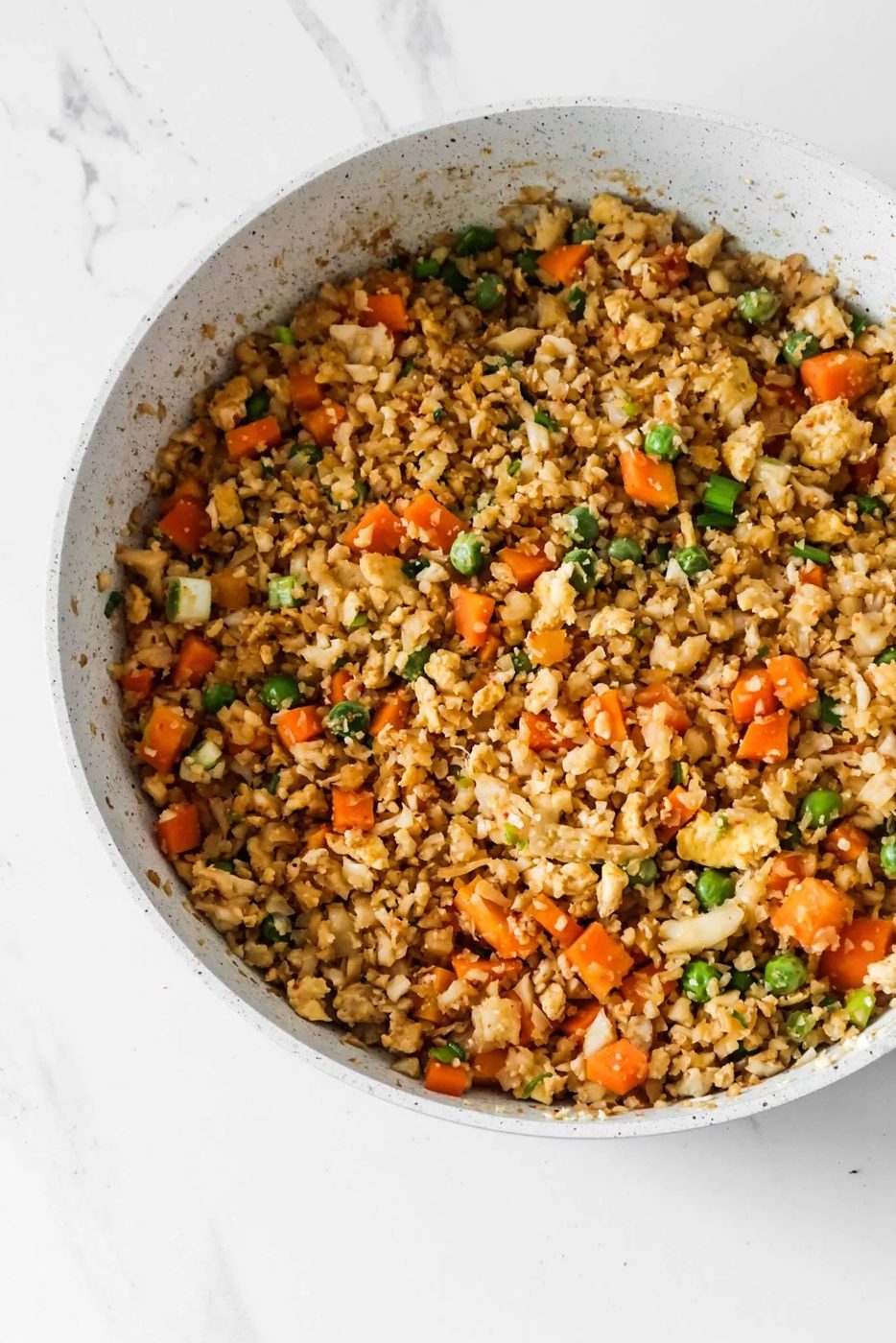 Simple cauliflower fried rice recipe! You’ll need cauliflower, eggs, tamari or soy sauce, vegetables of choice and some oil to make this…