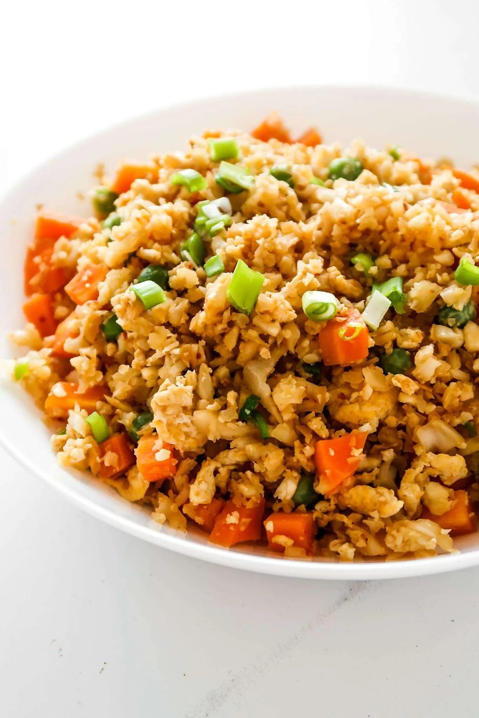 Simple cauliflower fried rice recipe! You’ll need cauliflower, eggs, tamari or soy sauce, vegetables of choice and some oil to make this…