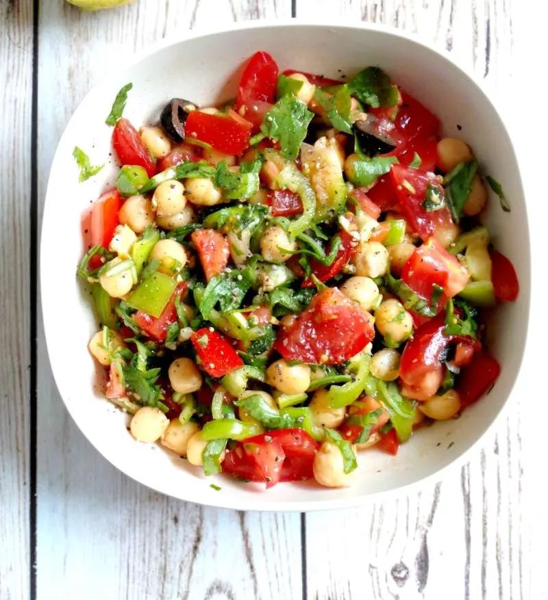Tomato, Garlic and Chickpea Salad Recipe - Vegan, Gluten-Free. Try this satisfying healthy chickpea salad for lunch or dinner! It’s…