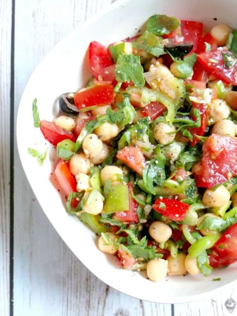 Tomato, Garlic and Chickpea Salad Recipe - Vegan, Gluten-Free. Try this satisfying healthy chickpea salad for lunch or dinner! It’s…