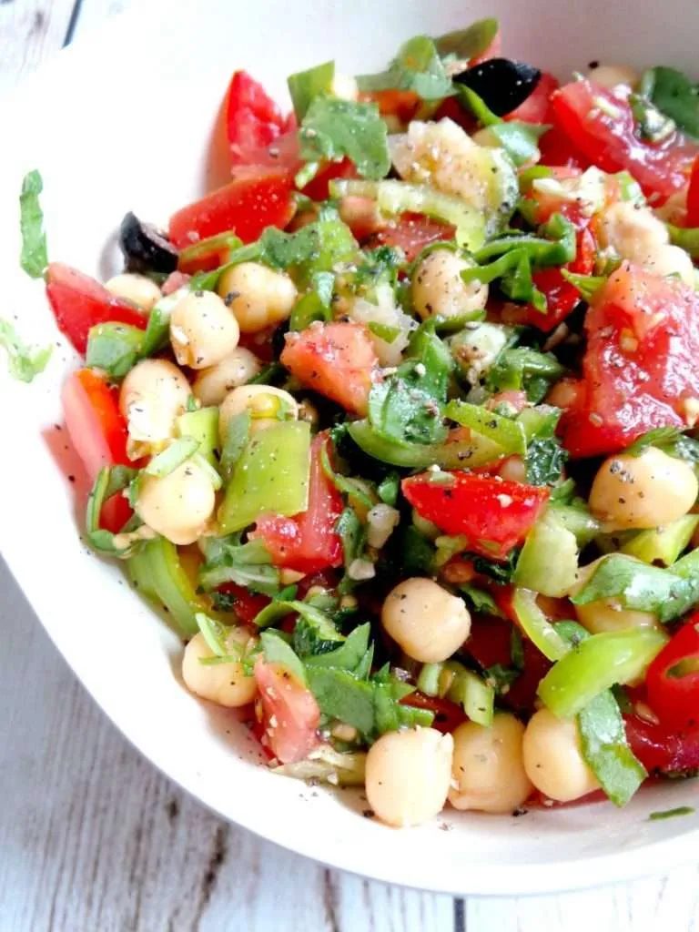 Tomato, Garlic and Chickpea Salad Recipe - Vegan, Gluten-Free. Try this satisfying healthy chickpea salad for lunch or dinner! It’s…
