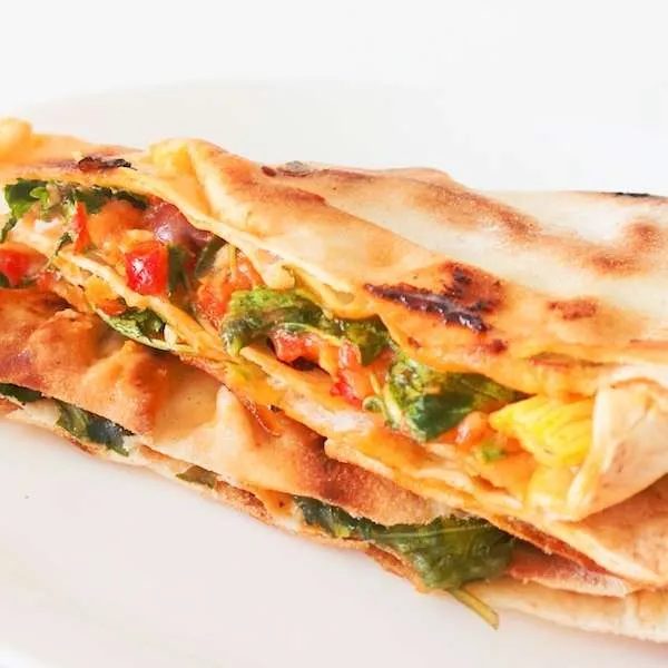 Simple vegetarian quesadillas, well pizza quesadillas! Filling is tomatoes, basil, cheese, arugula, garlic and some more vegetables!…