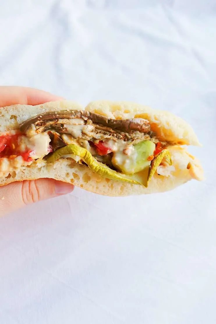 A healthy & simple vegan recipe you need to try - grilled vegetable pita with hummus and tahini sauce! |