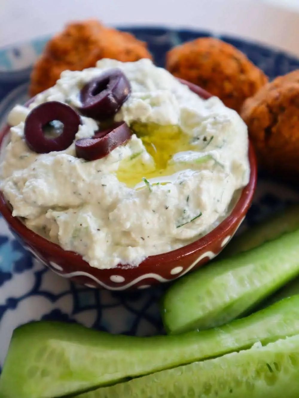 Need a dairy-free recipe for tzatziki - then make this simple vegan tzatziki and add it to healthy bowls or wraps! It's satisfying!