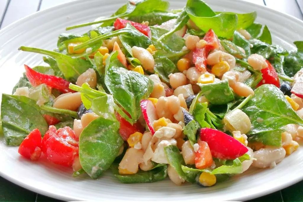 Spinach bean corn feta salad