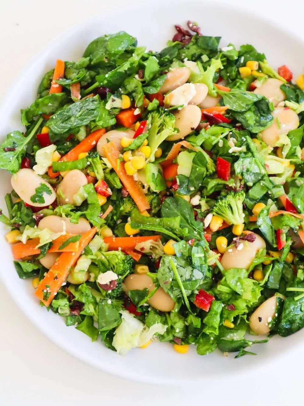 Spinach bean corn feta salad