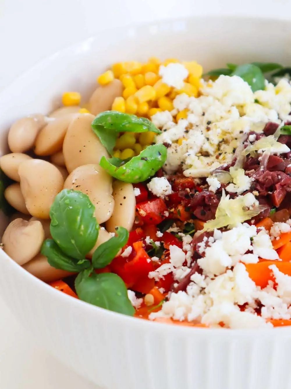 Spinach bean corn feta salad