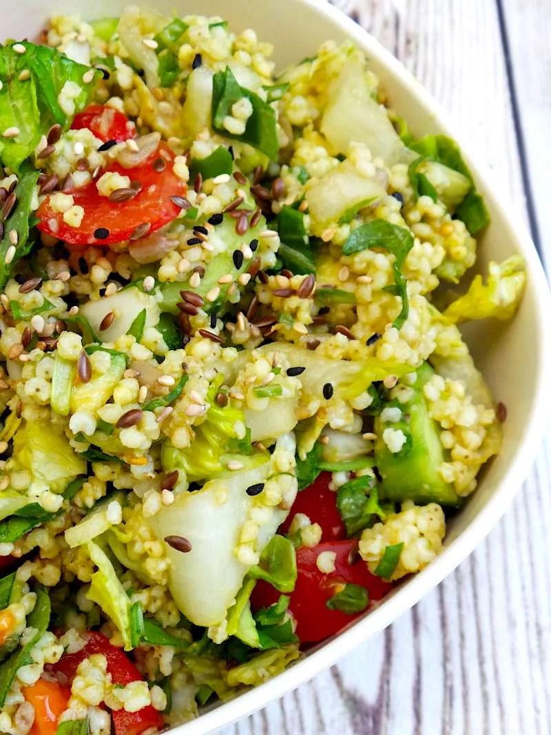 Summer salad with avocado & millet, healthy