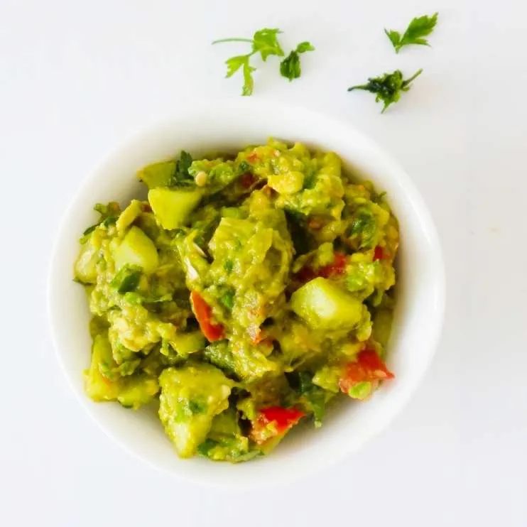 Guacamole with basil and cucumbers - healthy low-carb side dish you can eat in wraps, bowls and with dinner