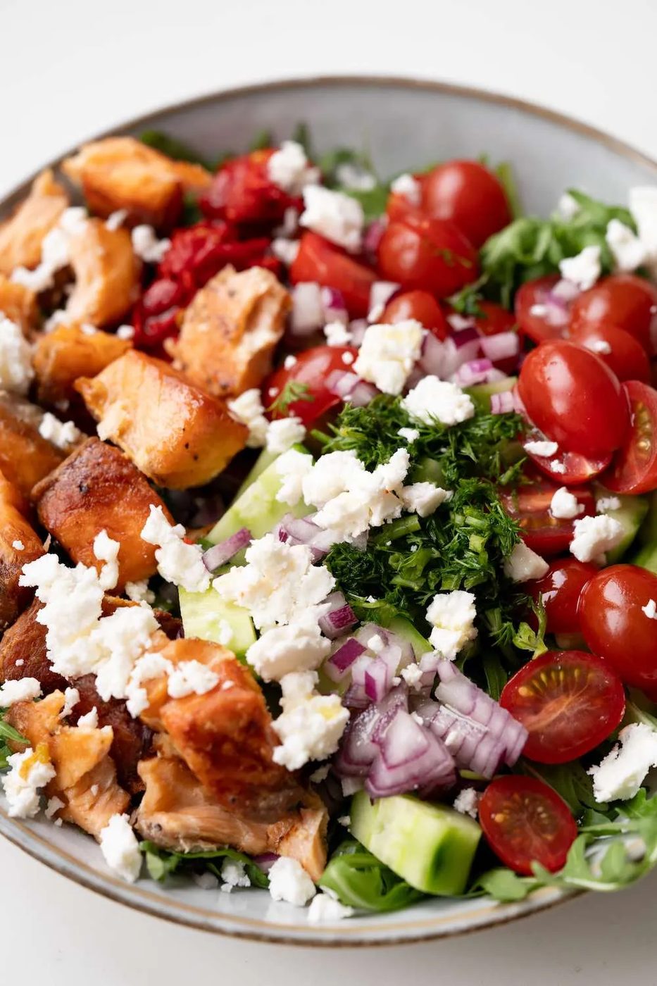 Made with roasted and fresh vegetables, pan-seared salmon and some feta cheese, this Mediterranean salmon salad is rich in protein…