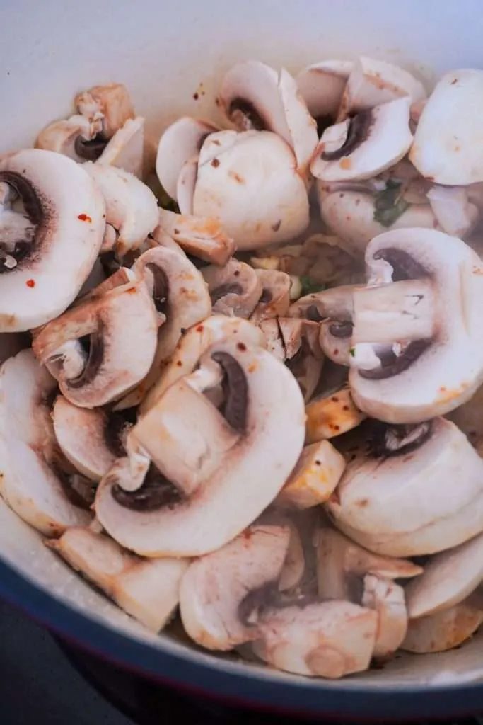 Add in the mushrooms and saute, stirring for about 2 minutes.