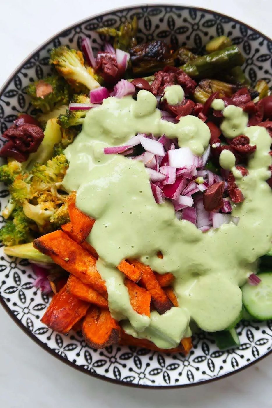 Roasted broccoli, sweet potatoes, asparagus and peppers make it into this healthy roasted vegetable salad! Drizzled with spicy creamy…
