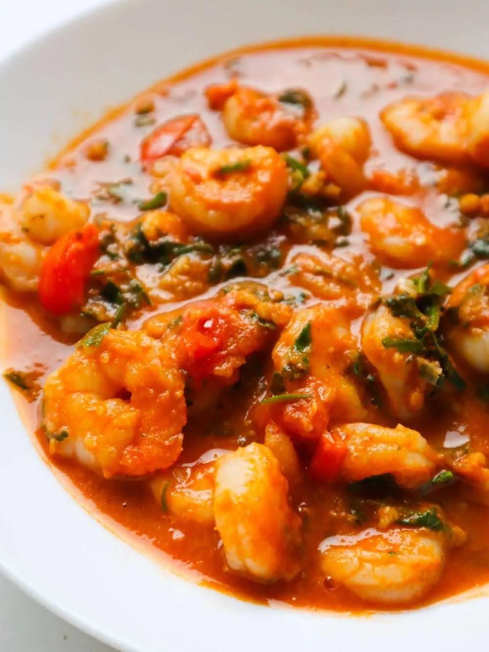 Shrimp and calamari in garlicky tomato sauce! This is a fast and simple healthy dinner recipe with seafood that is low carb, gluten-free…