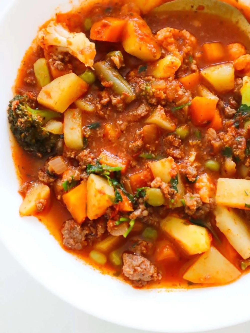 It's like chili but with potatoes, peas and some other vegetables - whatever vegetables you have. This dinner recipe is comforting…