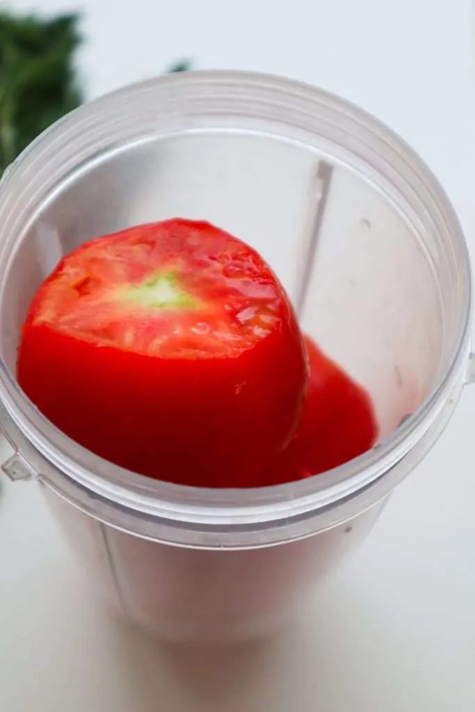wash and blend tomatoes to make sauce