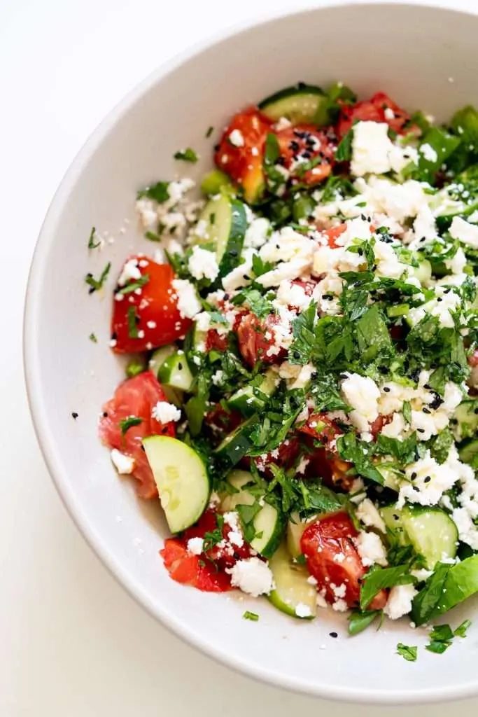 This is a reliable tomato cucumber feta salad! It also happens to be our favorite lunch during summer, you can not beat it on a hot day.