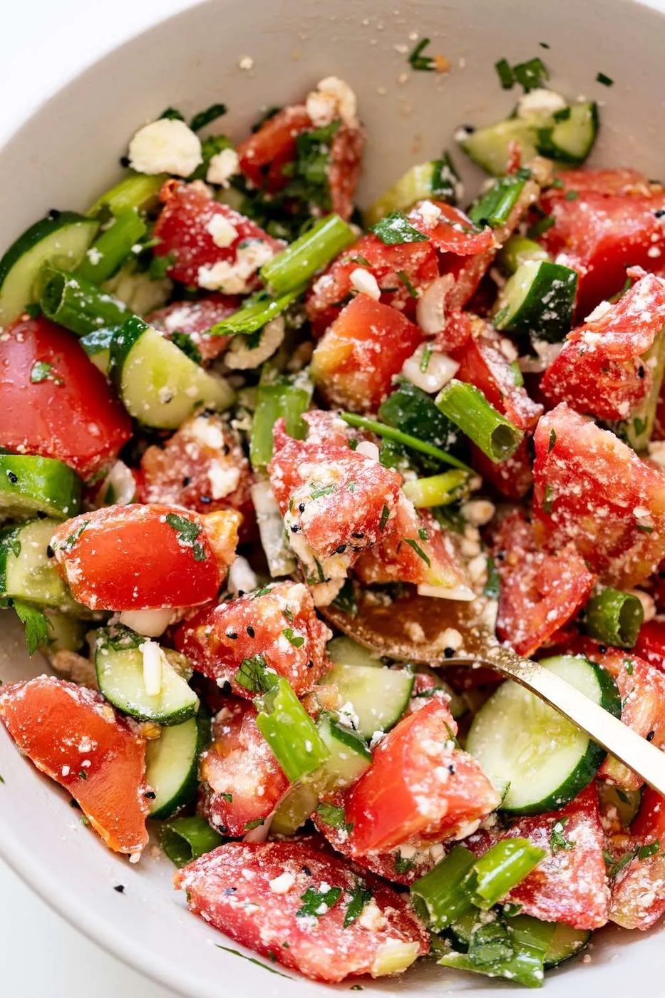 This is a reliable tomato cucumber feta salad! It also happens to be our favorite lunch during summer, you can not beat it on a hot day.