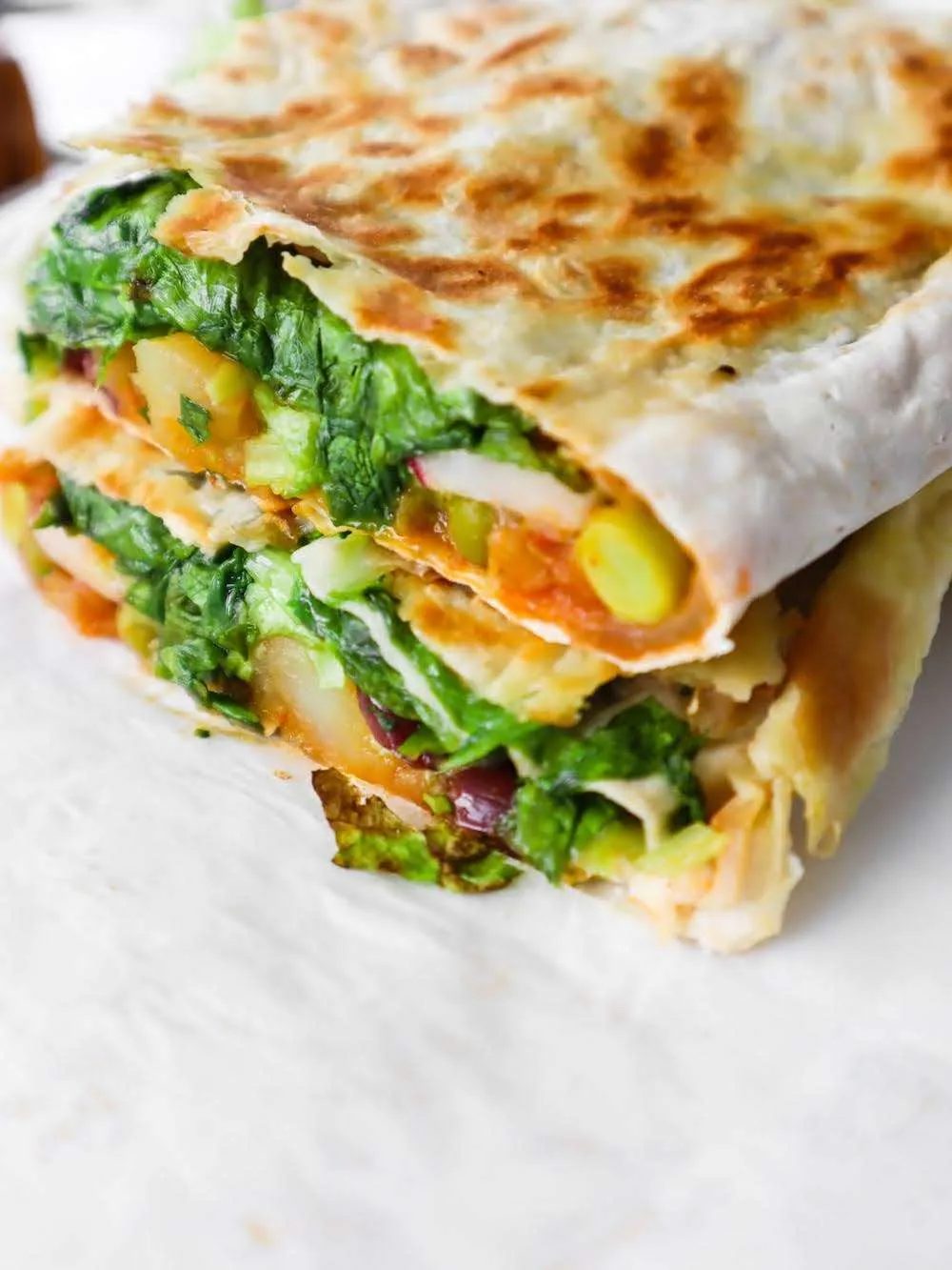 Grab some potatoes and make these absolutely satisfying vegan potato burritos with minimal effort for dinner tonight!