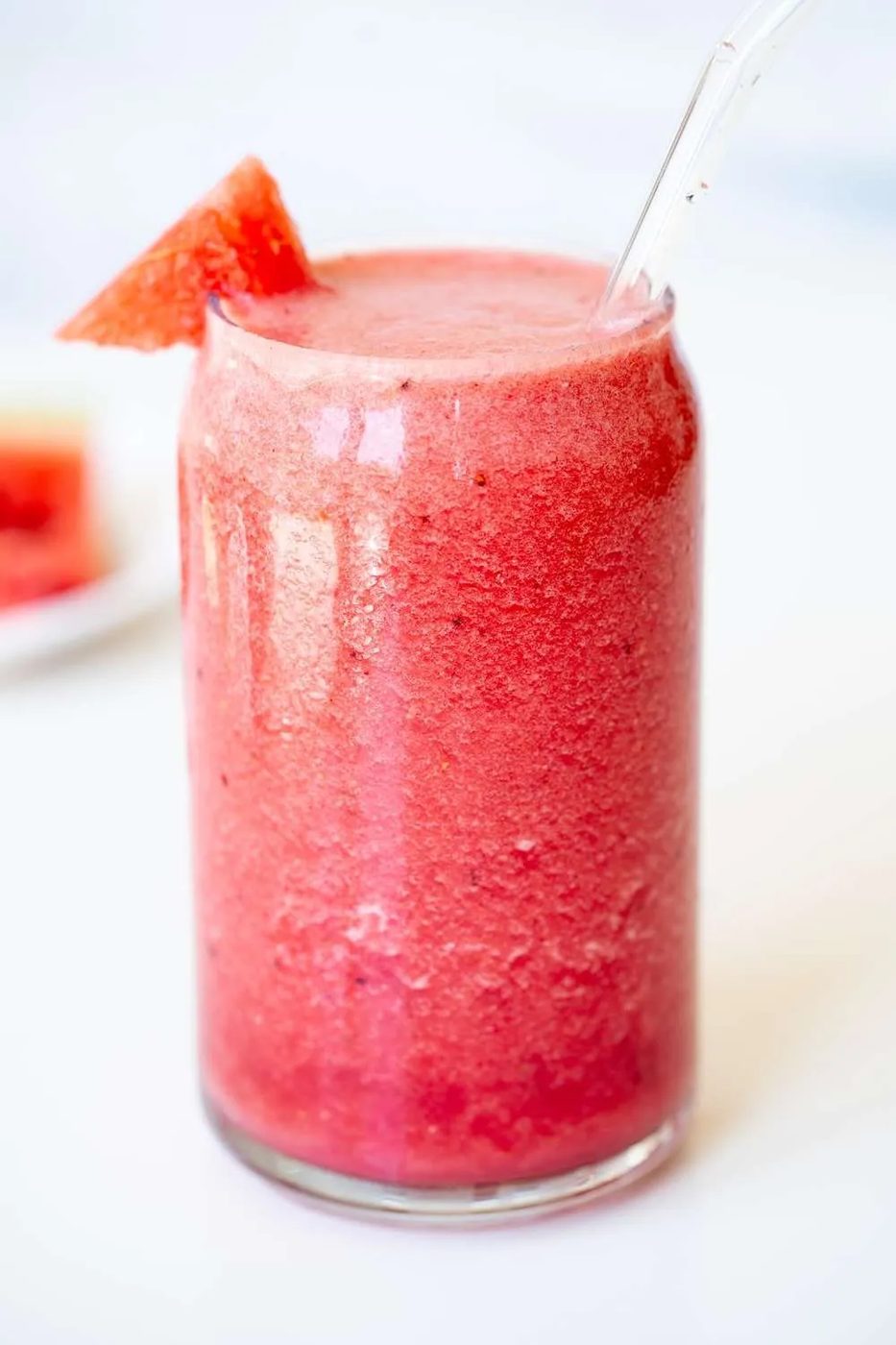 healthy watermelon smoothie with strawberries! This is a simple 2-ingredient strawberry watermelon smoothie recipe that is the solid summer…