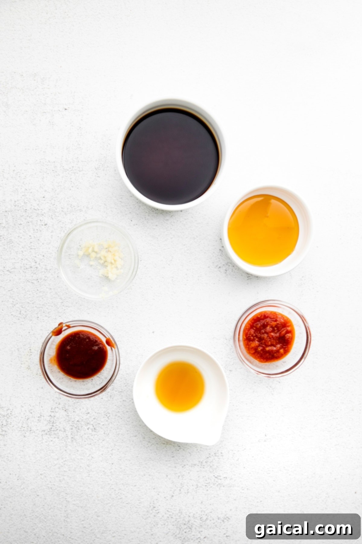 Wholesome Ingredients for Healthy Kung Pao Sauce Preparation Homemade Kung Pao sauce being mixed in a glass bowl, showcasing its rich color and smooth texture before adding to the stir fry