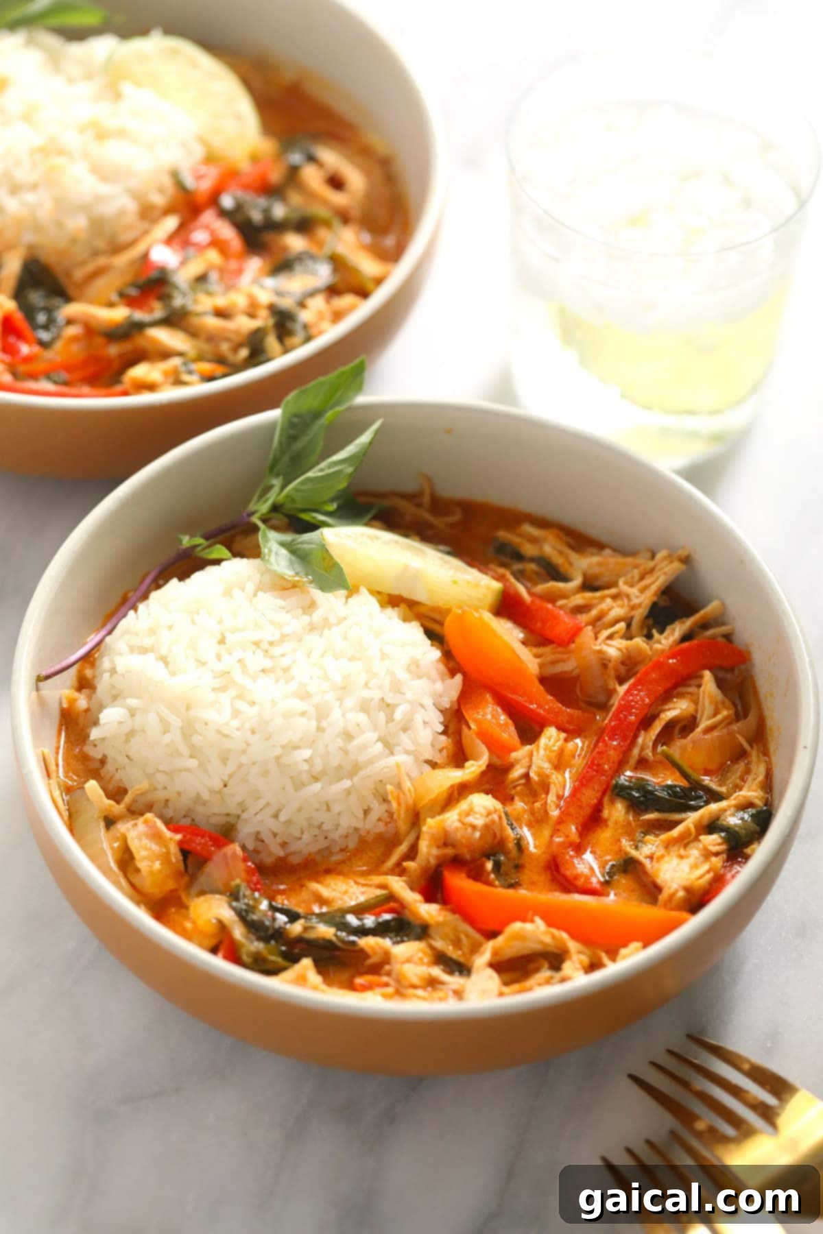 Ready-to-Eat Coconut Curry Chicken coconut curry in bowl with forks
