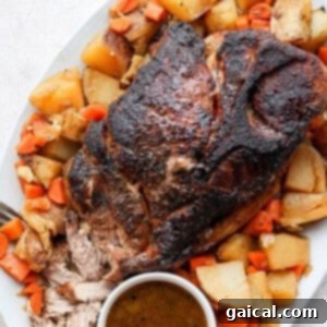 Succulent Pork Roast 3 Crispy-skinned pork shoulder roast with a succulent interior