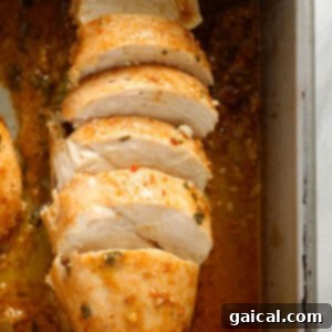Chicken marinating in a pan, showcasing the delicious marinade.