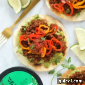 Guacamole tostada with peppers, a vibrant and healthy meal option.