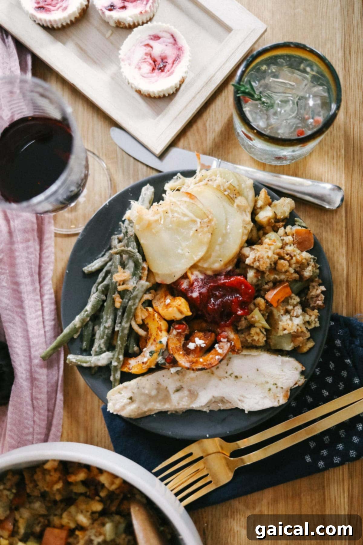 Thanksgiving plate on table with various healthy dishes