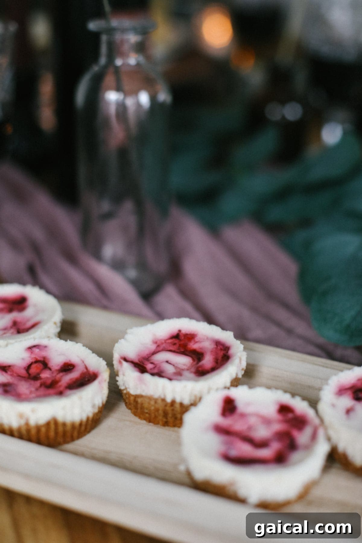 Mini cranberry swirl cheesecakes