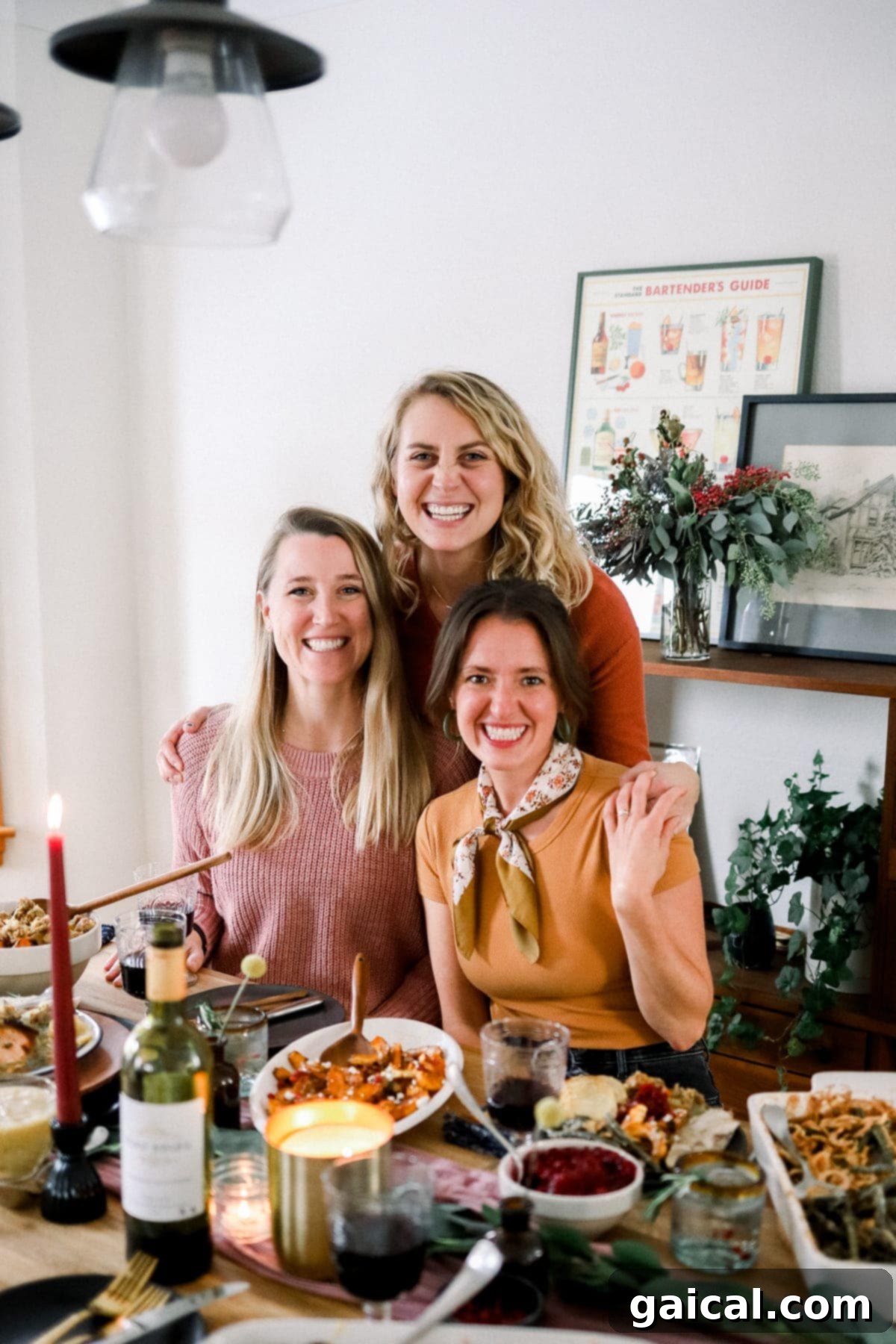 Team Fit Foodie gathered around Thanksgiving table