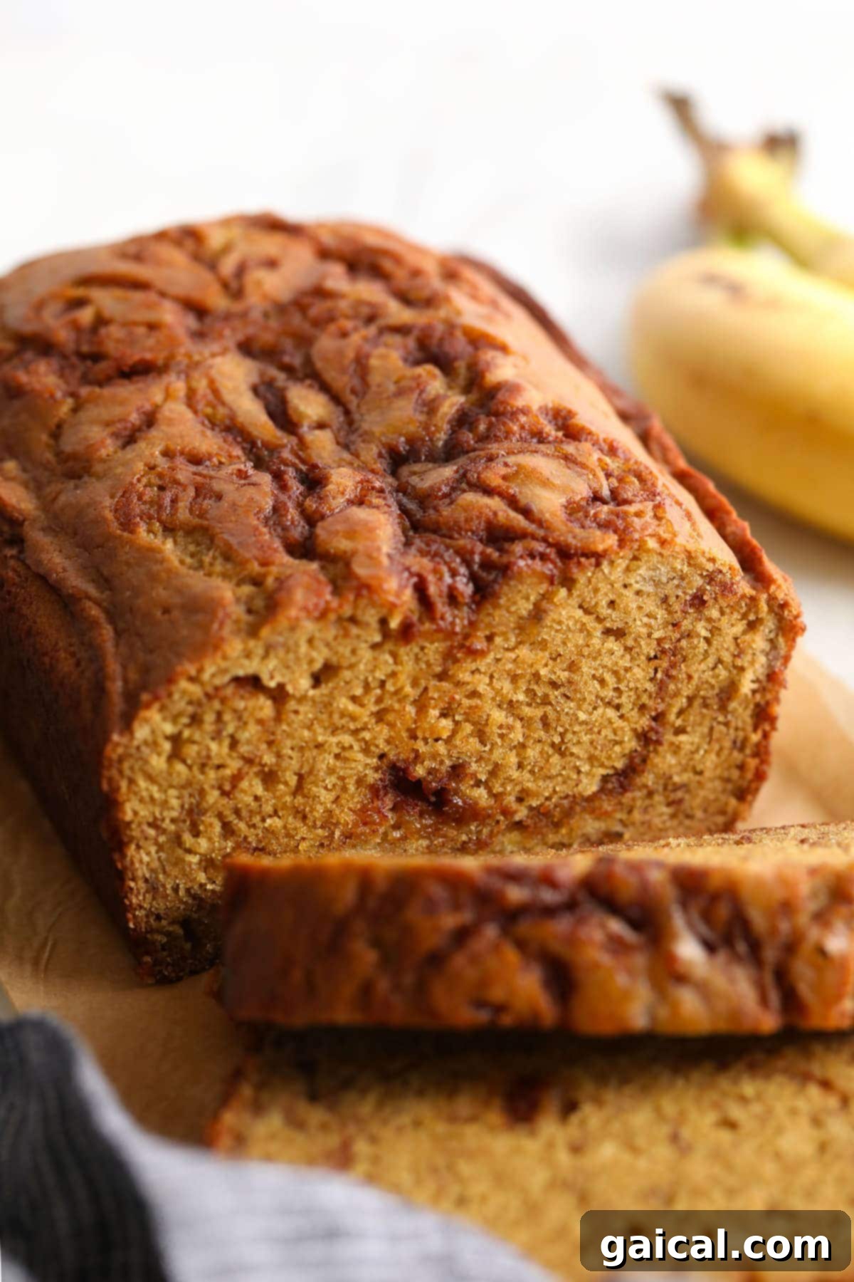 Heavenly Cinnamon Swirl Banana Bread 7 Perfectly sliced cinnamon swirl banana bread revealing the intricate cinnamon pattern and moist texture.
