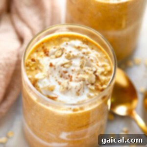 Pumpkin Overnight Oats in a jar, garnished and ready to serve.