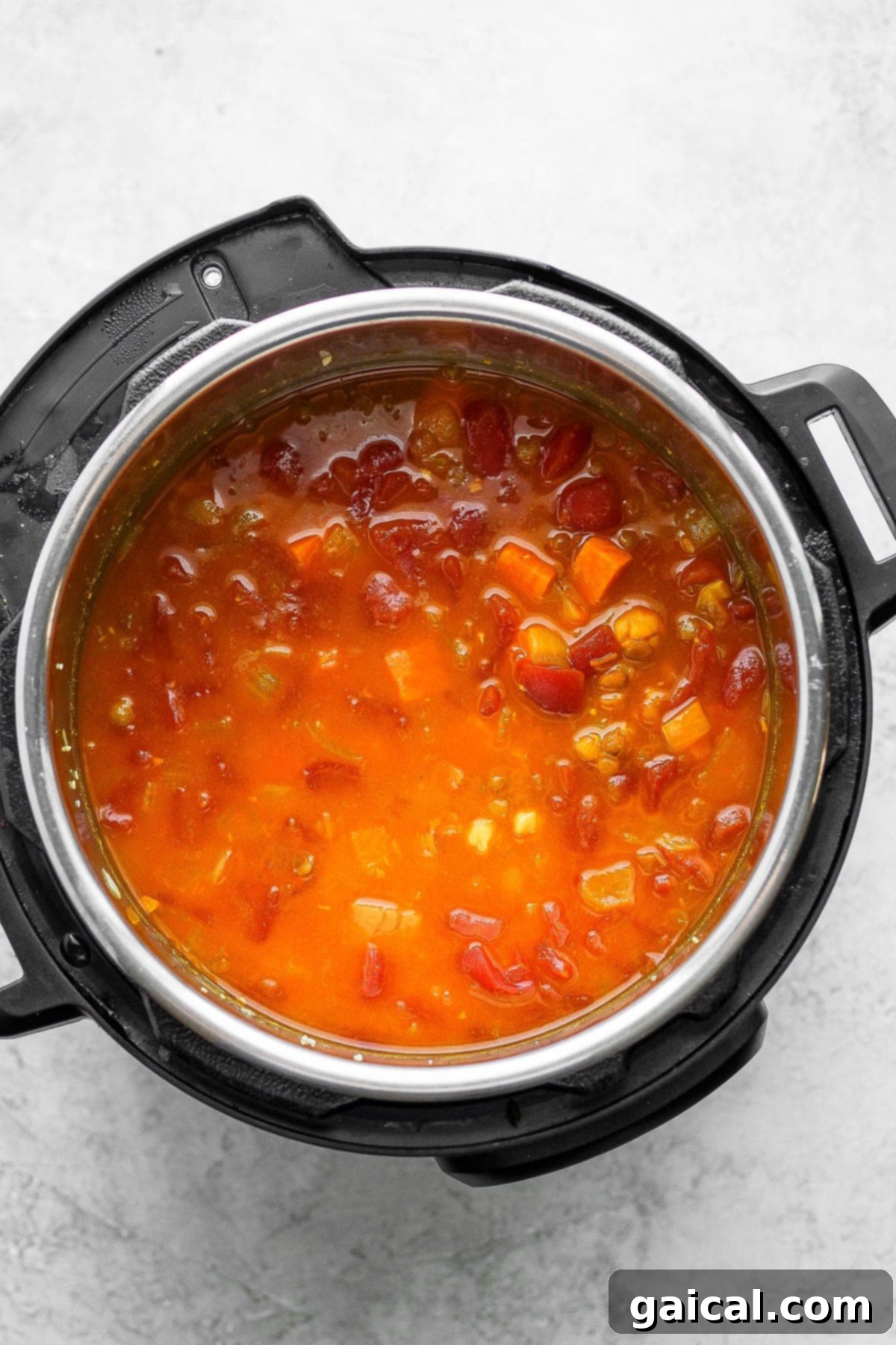 Cooked Instant Pot lentil soup in the Instant Pot pot.