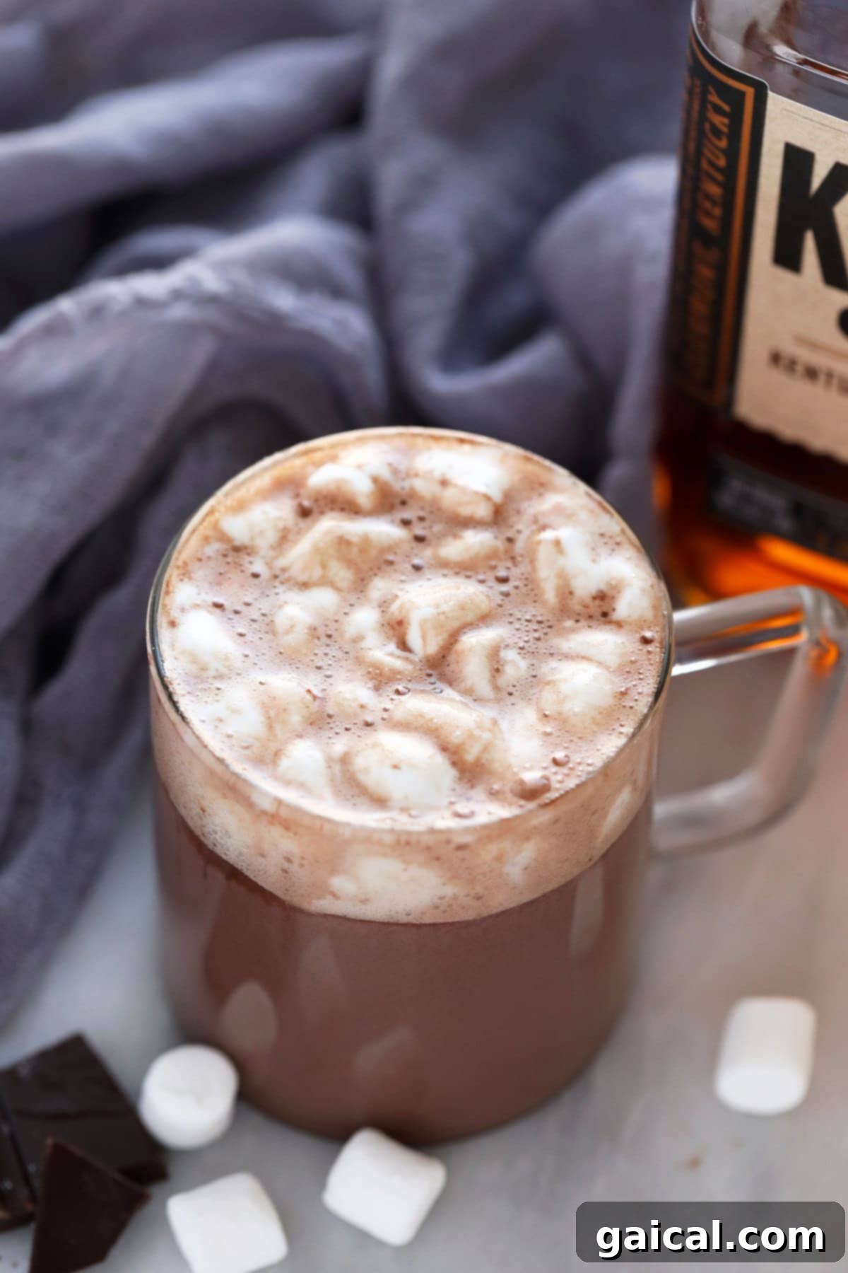 Easy Spiked Hot Chocolate with Mini Marshmallows A steaming mug of easy spiked hot chocolate topped with fluffy mini marshmallows, ready to be enjoyed on a chilly day.