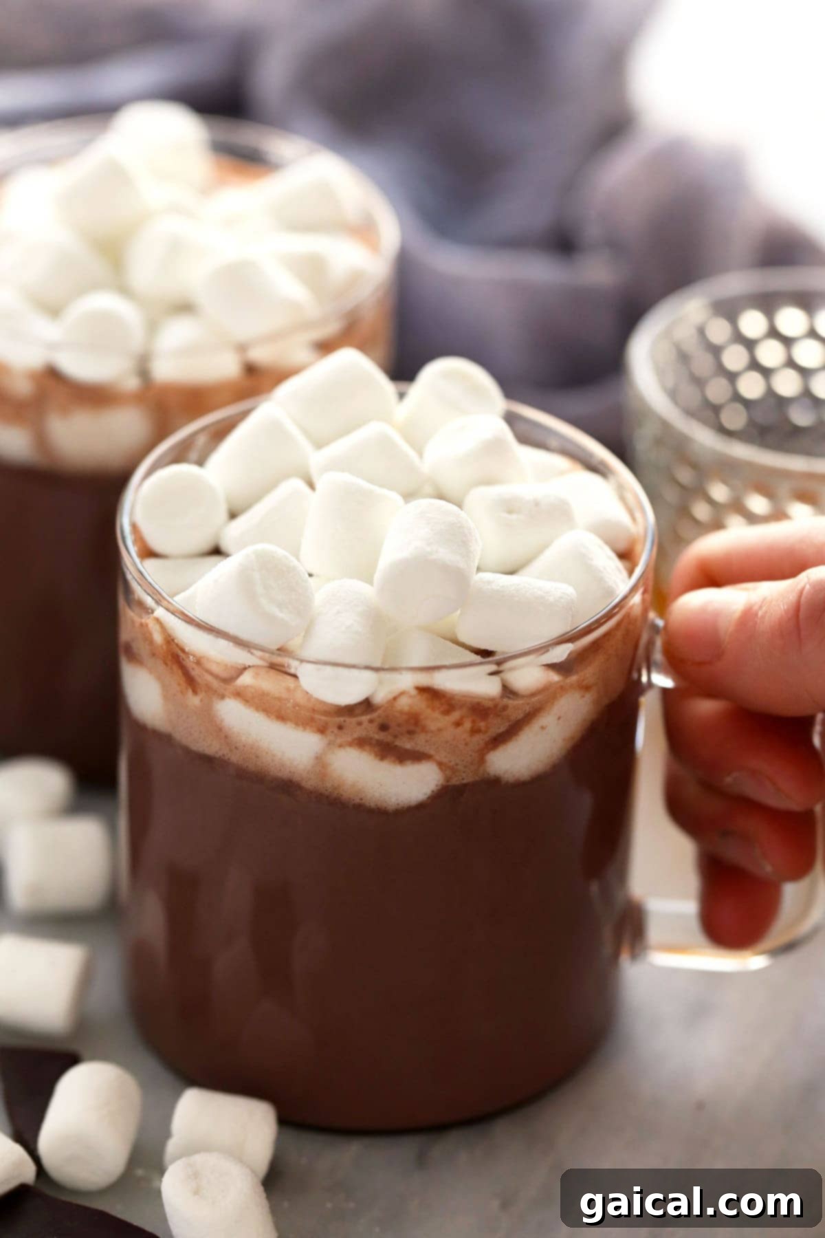 Spiked Hot Chocolate with Melted Marshmallows Topping A festive mug of easy spiked hot chocolate generously topped with beautifully melted mini marshmallows, ready for a warm, comforting sip.