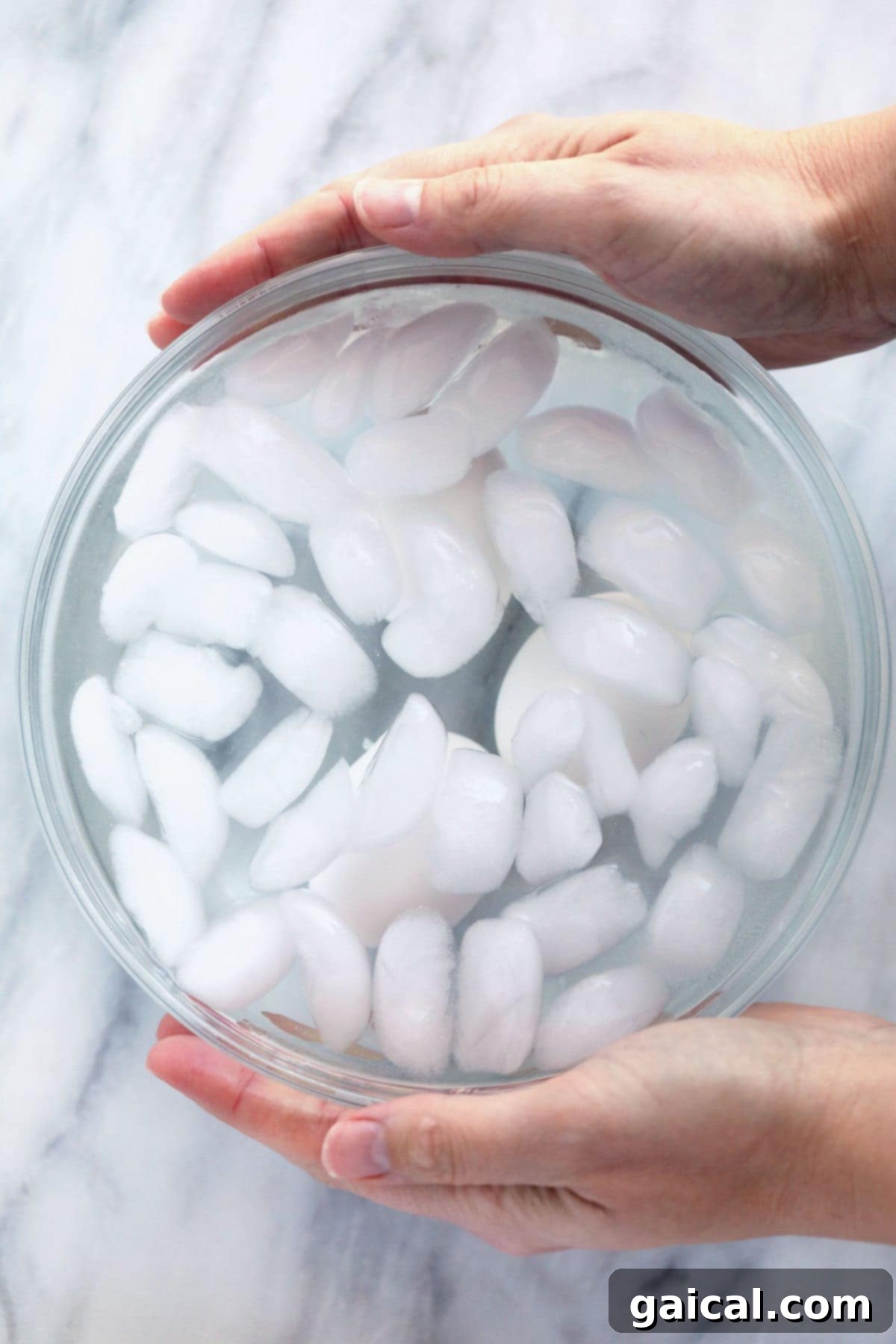 Looking to make PERFECT hard boiled eggs? This hard boiled eggs recipe is foolproof and will get you the exact kind of yolk you want! hard boiled eggs in ice water
