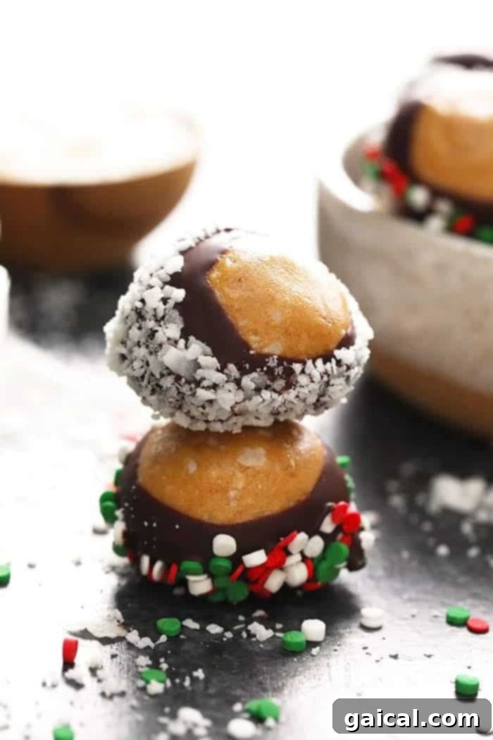 Guilt-Free Protein Buckeye Bites 5 A stack of healthy chocolate covered peanuts with sprinkles on top.