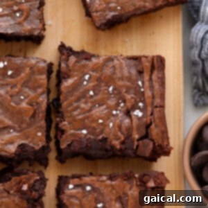 Fudgy brownies on cutting board, ready for serving