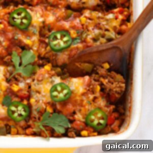Mexican casserole in a casserole dish ready for serving