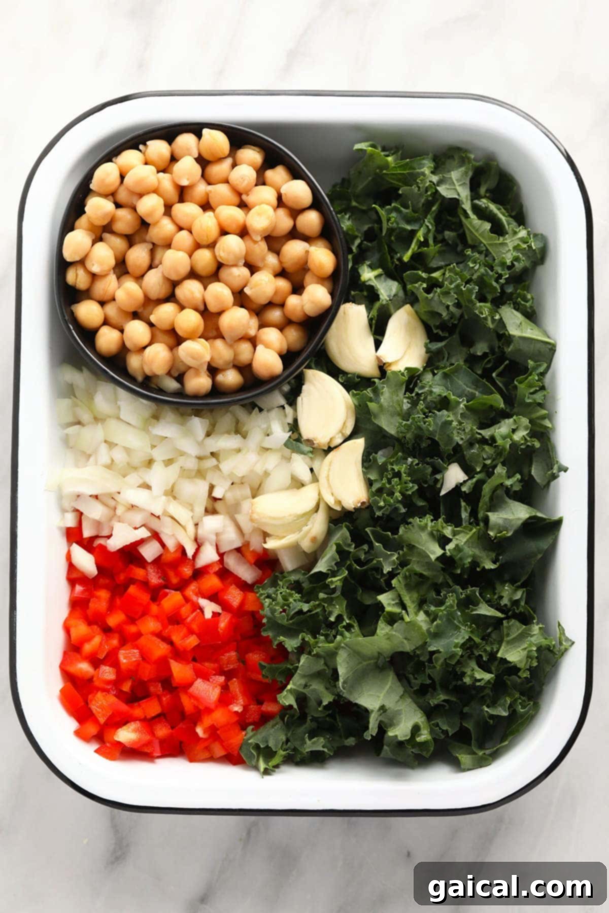 Chickpea Curry Ingredients Ready to Cook Fresh, colorful ingredients for chickpea curry laid out before being added to a Dutch oven for cooking.