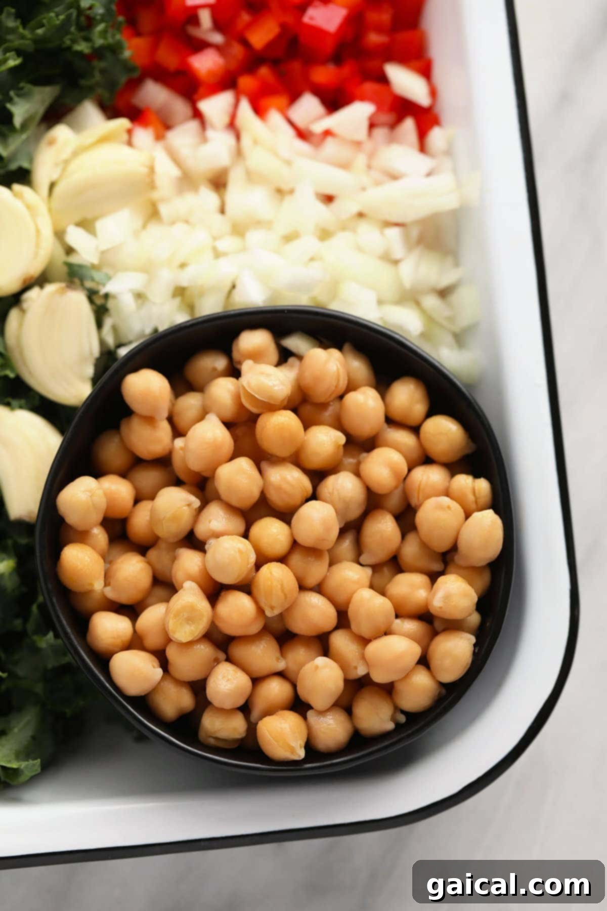 Ready-to-Use Chickpeas for Curry Freshly drained chickpeas in a bowl, ready to be incorporated into the aromatic curry sauce.