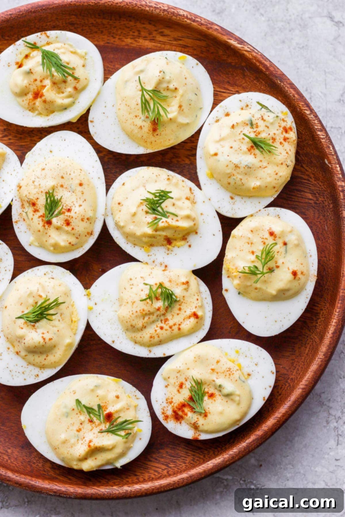 Freshly prepared easy deviled eggs, ready to delight. A plate of easy deviled eggs, perfectly garnished and arranged, ready to be served at a gathering or enjoyed as a delicious snack.