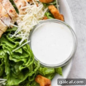 Ultimate Chicken Caesar 2 Caesar dressing in a bowl, smooth and creamy.