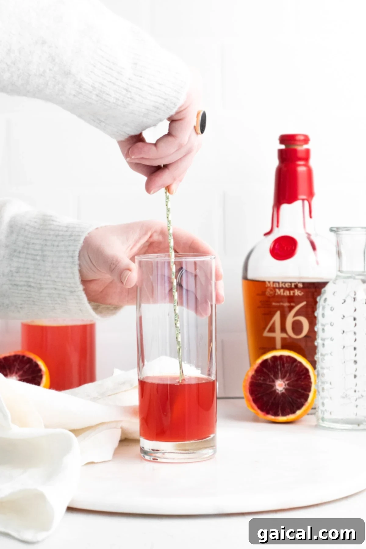 The finished Blood Orange Smash cocktail, perfectly garnished with a blood orange slice and ready to be enjoyed.