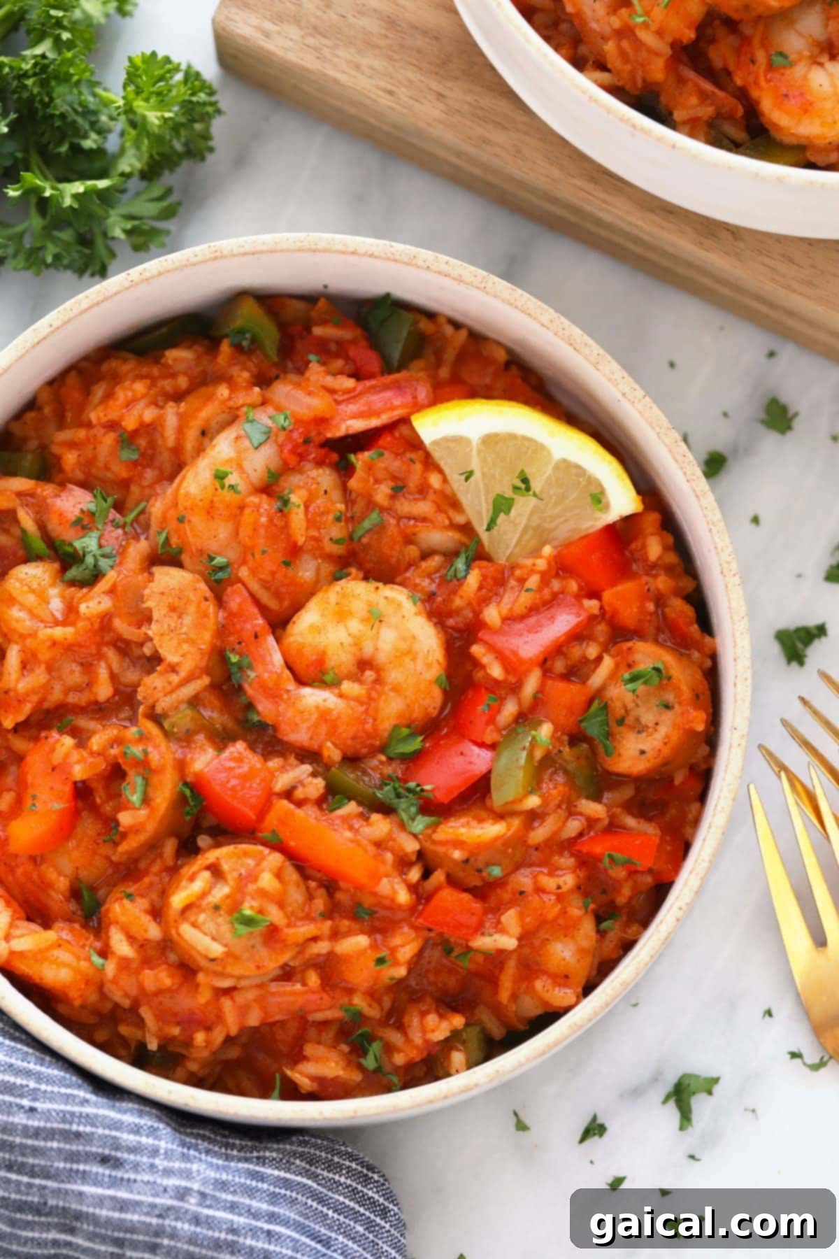 Easy Instant Pot Jambalaya 8 A beautifully plated bowl of Instant Pot Jambalaya, garnished with fresh herbs, showcasing its vibrant colors and delicious texture, perfect for a satisfying meal.