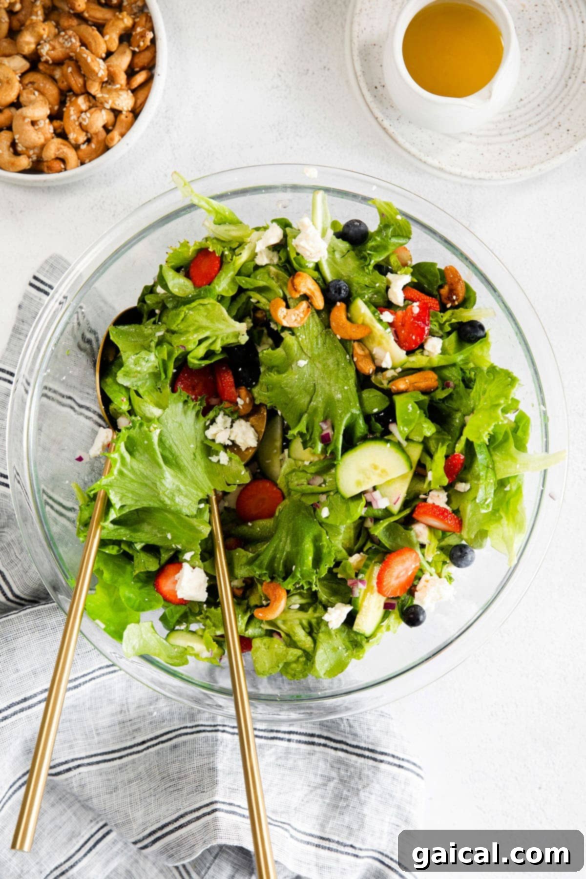 Vibrant Spring Greens 5 A vibrant spring mix salad artfully arranged in a large salad bowl.